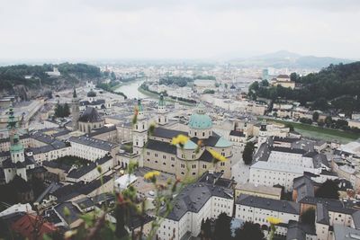 High angle view of buildings against sky in city