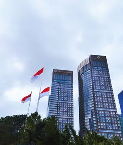 Low angle view of flag against sky