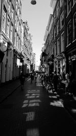 People walking on street in city