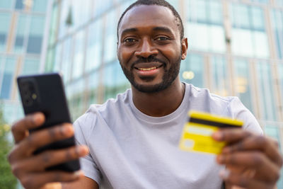 Young man using mobile phone