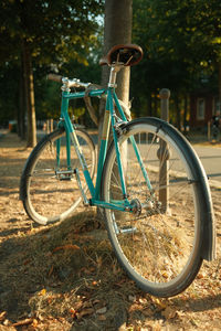 Bicycle parked on field