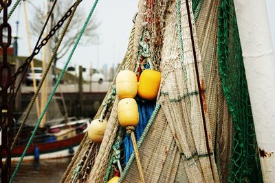 Rope tied to fishing net in harbor