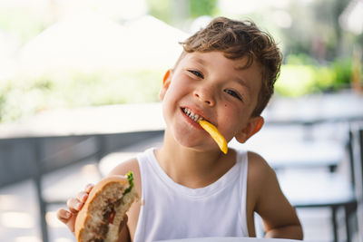 Close-up of boy eating food