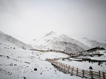 Scenic view of snowcapped mountain against sky