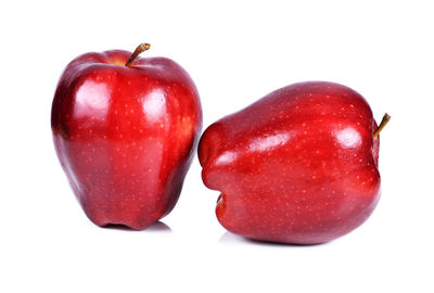 Close-up of apple against white background