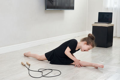 Girl doing split at home