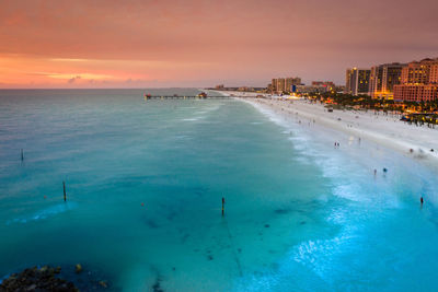 High angle view of sea against sky during sunset