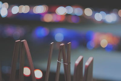 Close-up of illuminated lights at night