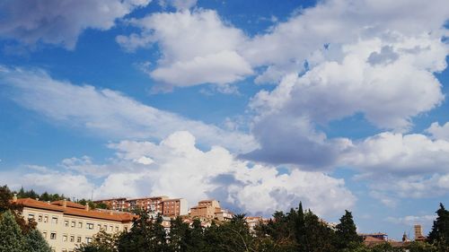 Low angle view of town against sky