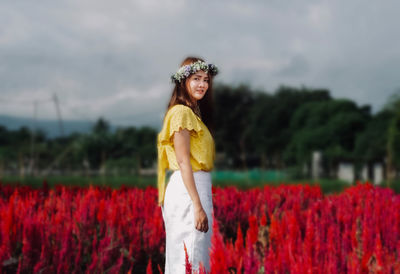 Woman standing on field
