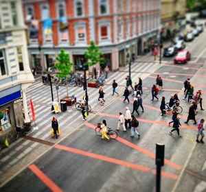 People walking on road in city