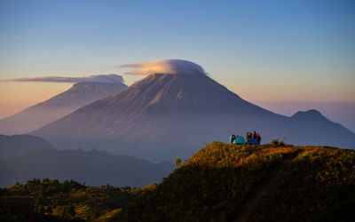 Scenic view of mountains against sky during sunset