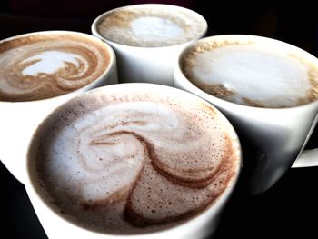 Close-up of cappuccino on table