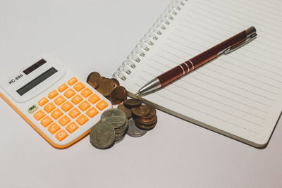 High angle view of pen on table against white background