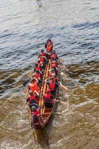 High angle view of people in boat in river