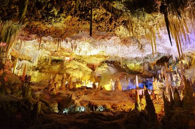 Low angle view of illuminated cave