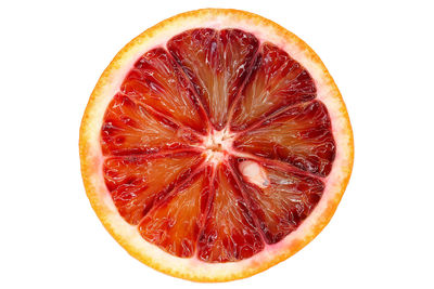 Close-up of apple slices on white background