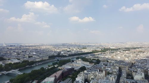 High angle view of buildings in city against sky