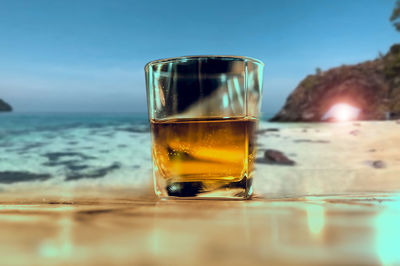 Close-up of beer in glass on table