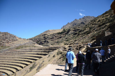 Tourists on mountain landscape