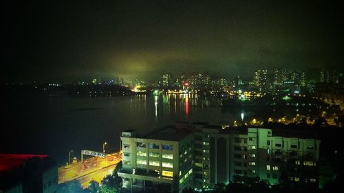 High angle view of illuminated city at night