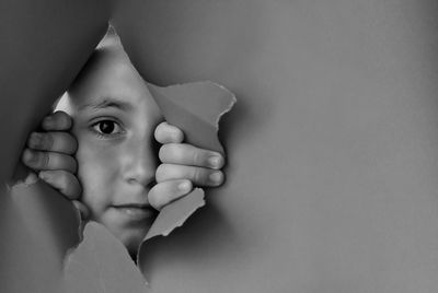 Portrait of boy peeking