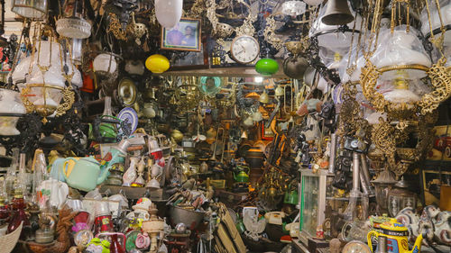 Messy antique shop selling many vintage items in triwindu antique market surakarta, indonesia.