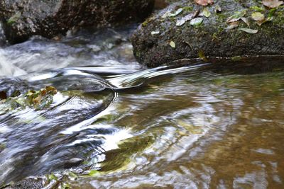 Close-up of water flowing in river