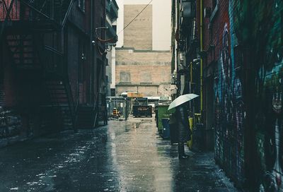 Narrow alley along buildings