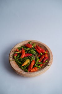 Close-up of salad in bowl against white background