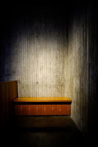 Close-up of illuminated lighting equipment in dark room