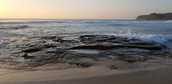 Scenic view of sea against clear sky