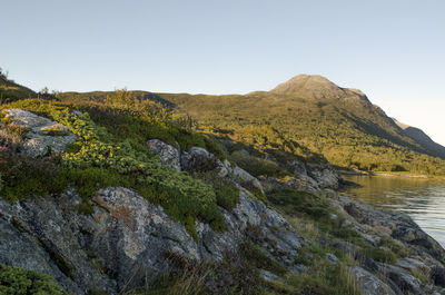 Low angle view of mountain against clear sky