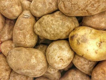 Full frame shot of potatoes for sale at market stall