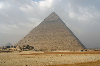 Built structure on desert against sky