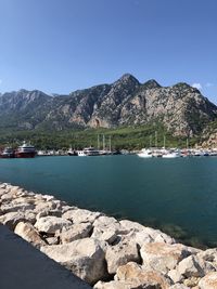 Scenic view of sea against clear blue sky