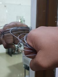 Close-up of hand holding glass