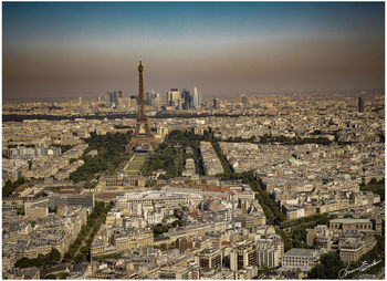 Aerial view of city buildings against sky