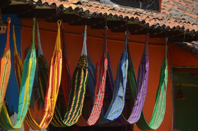 Multi colored umbrellas hanging on clothesline