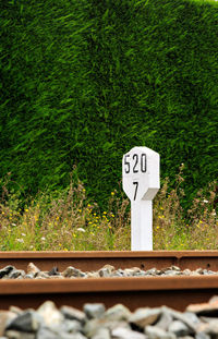 Information sign on railroad track