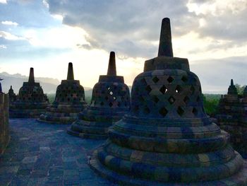 Temple against cloudy sky