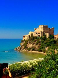 Scenic view of sea against clear sky