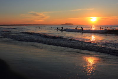 View of calm sea at sunset