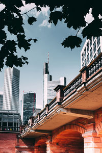 Buildings in city against sky