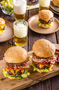 Close-up of burger on serving board at table