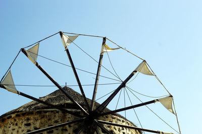 Low angle view of metallic structure against sky