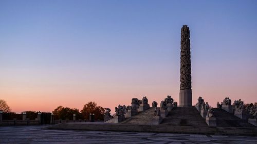 Cross against clear sky during sunset