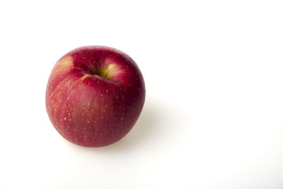 Close-up of apple against white background