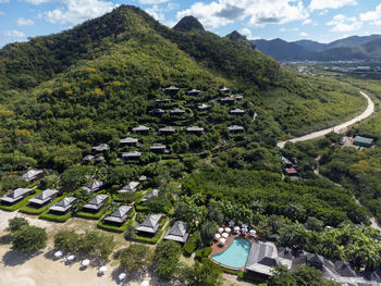 High angle view of trees and mountains against sky