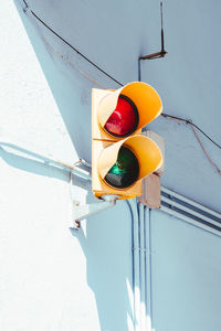 Low angle view of illuminated road signal